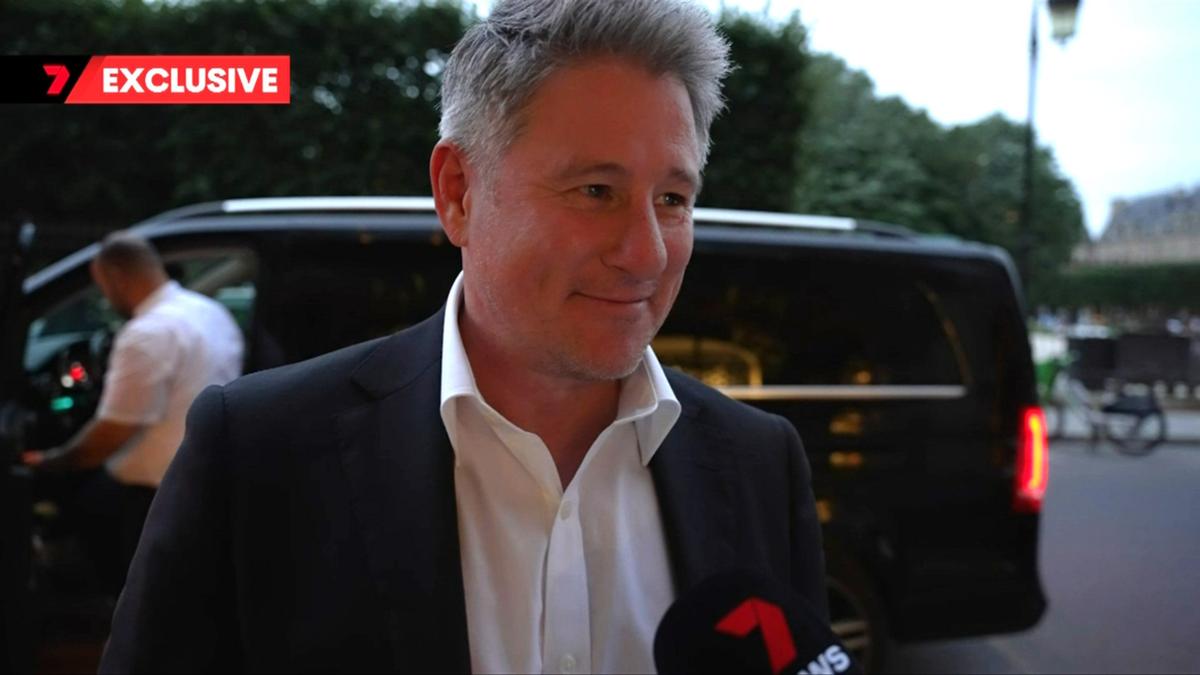 Nine CEO Mike Sneesby was questioned by reporters in Paris.