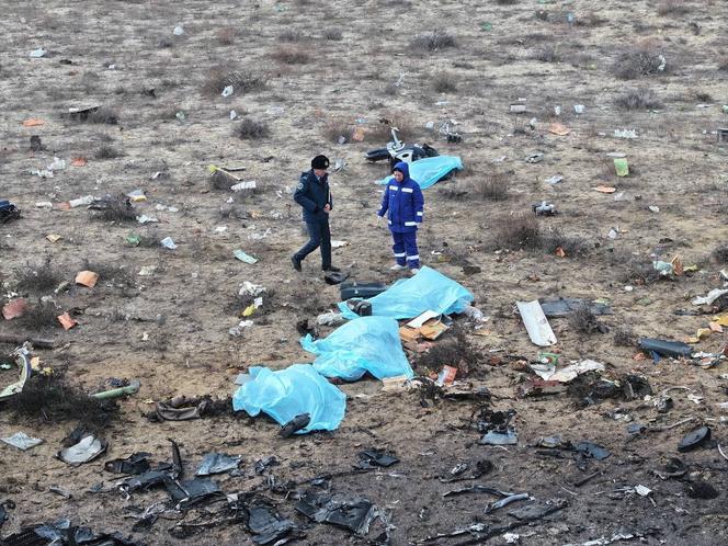 A drone view shows emergency specialists working at the crash site near the city of Aktau, Kazakhstan, December 25, 2024.