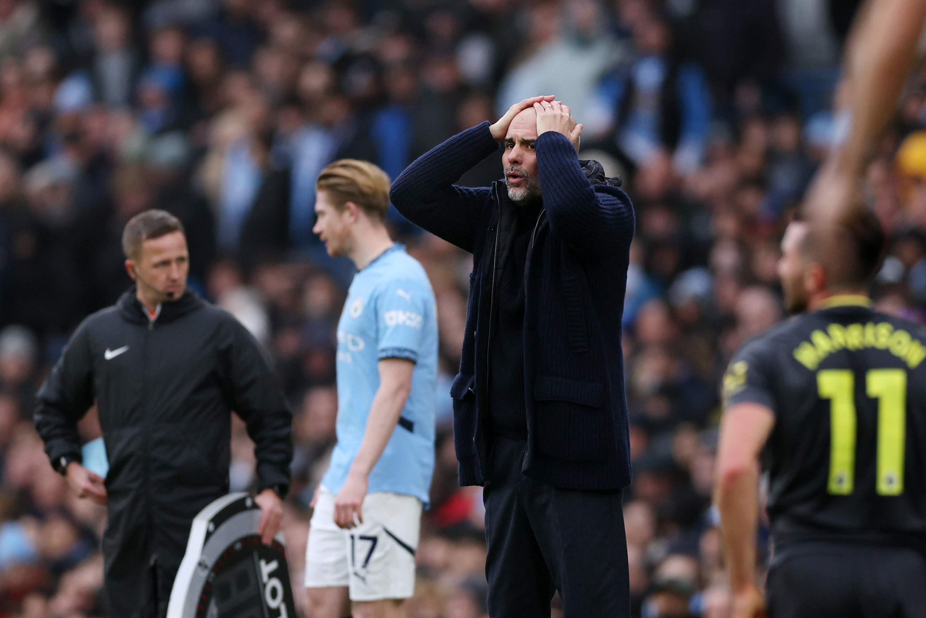 MANCHESTER, ENGLAND - DECEMBER 26: Pep Guardiola, Manager of Manchester City, reacts during the Premier League match between Manchester City FC and Everton FC at Etihad Stadium on December 26, 2024 in Manchester, England. (Photo by Molly Darlington/Getty Images)