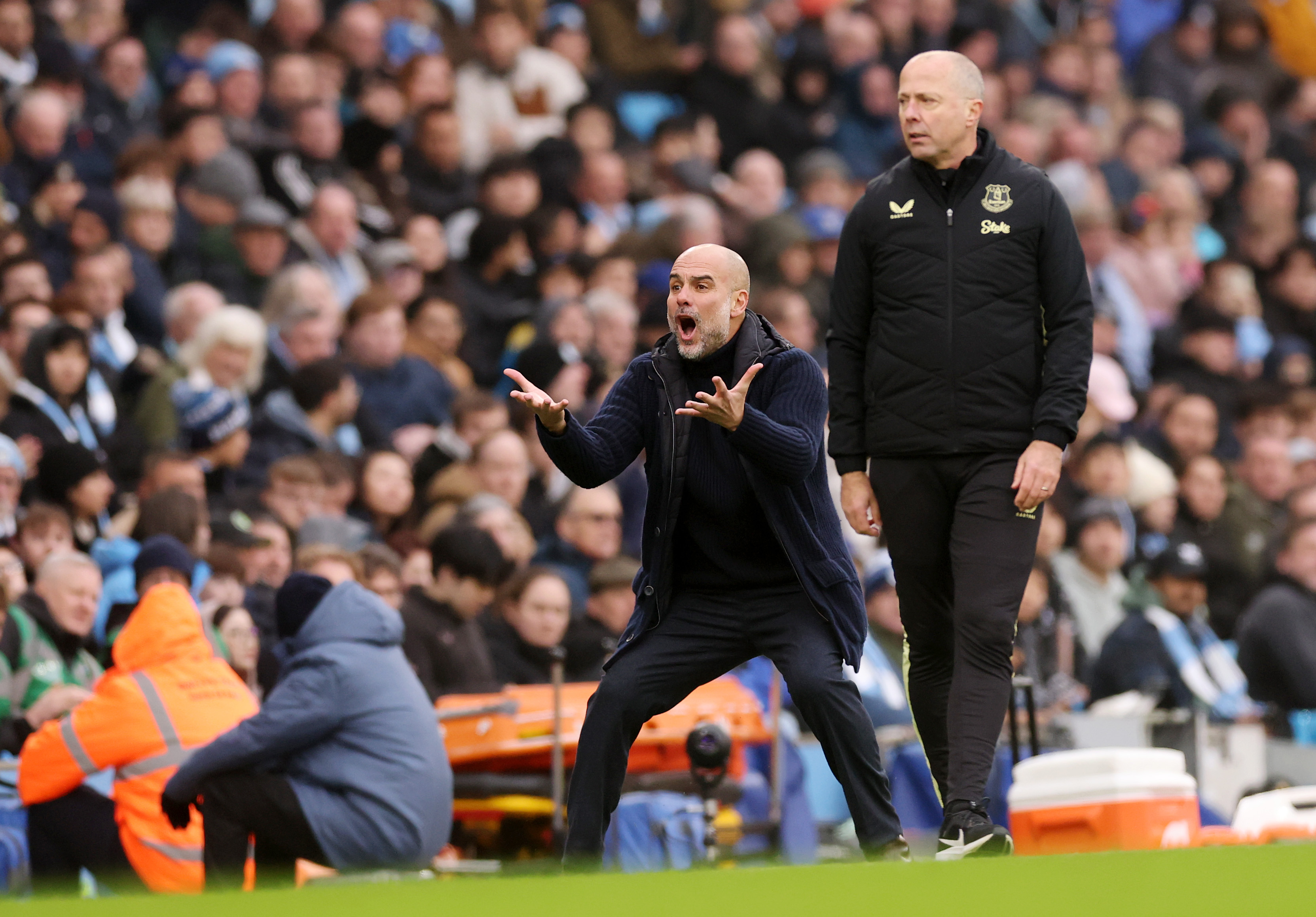 MANCHESTER, ENGLAND - DECEMBER 26: Pep Guardiola, Manager of Manchester City, reacts during the Premier League match between Manchester City FC and Everton FC at Etihad Stadium on December 26, 2024 in Manchester, England. (Photo by Carl Recine/Getty Images)