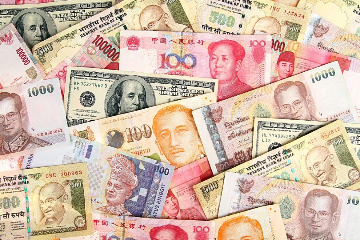 Asia FX holds sharp losses as dollar firms ahead of key US data – Investing.com
